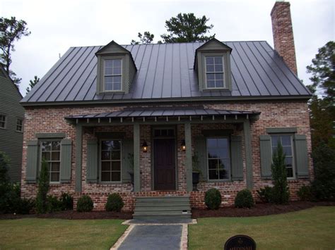 cocoa brown metal roof red brick house|brick house metal roof colors.